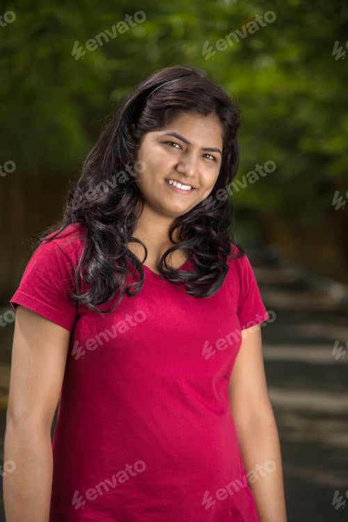 Preview: Portrait Of Beautiful Young Girl Outdoors In Park.