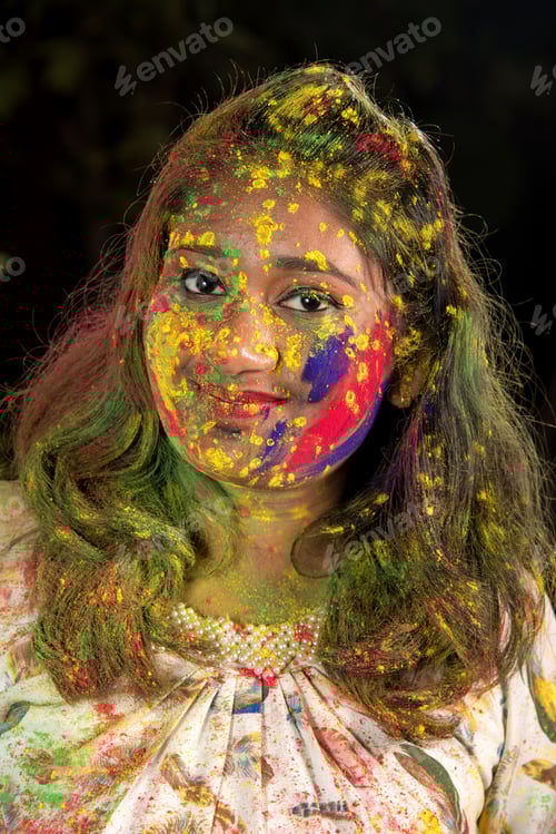 Preview: Portrait Of Happy Young Girl On Holi Color Festival. Girl Posing And Celebrating Festival Of Colors.