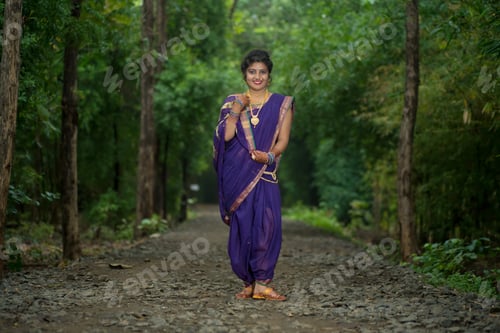 Preview: Beautiful Indian Young Girl In Traditional Saree Posing Outdoors