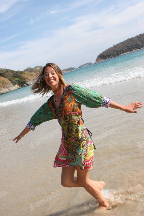 Preview: Beautiful Woman Running On The Beach.
