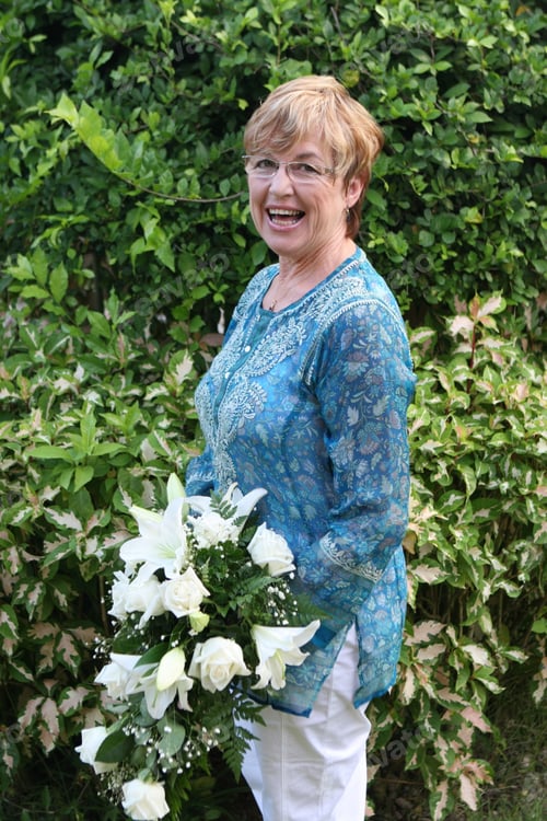 Preview: Mature Bride With A Bouquet Of Flowers.