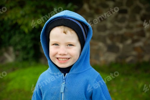 Preview: Portrait Of A Happy Boy Dressed In Winter Clothing.
