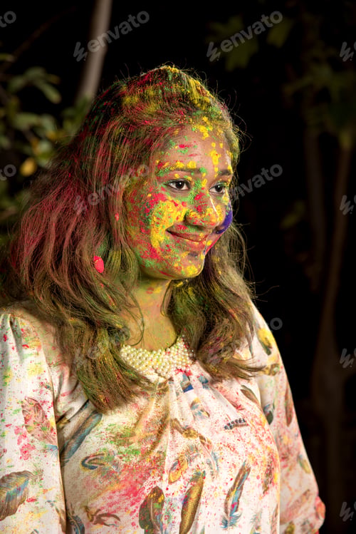 Preview: Portrait Of Happy Young Girl On Holi Color Festival. Girl Posing And Celebrating Festival Of Colors.
