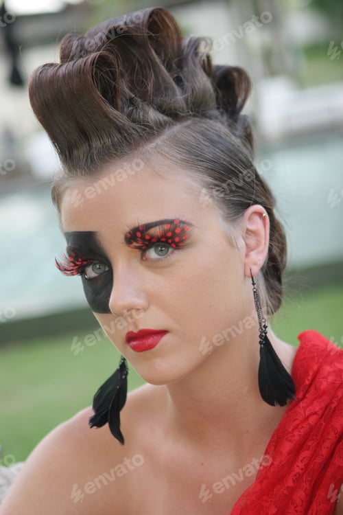 Preview: Fashion Image With Bold Make-Up And Modern Hairstyle.