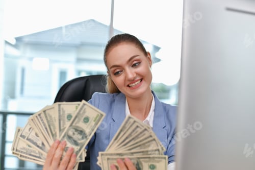Preview: Business Concepts(Online Business). Young Businesswoman Holding Money In Hand. Young Business