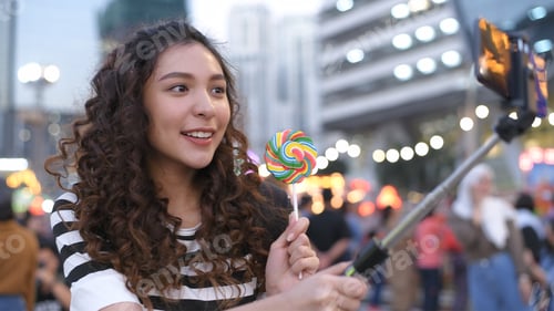 Preview: A Beautiful Girl Is Filming Video At A Celebration.