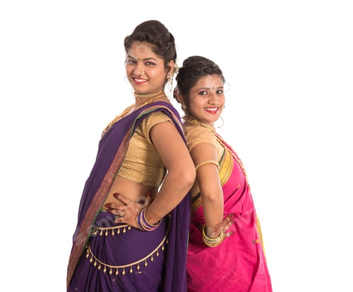 Preview: Traditional Beautiful Indian Young Sisters In Saree Posing On White Background
