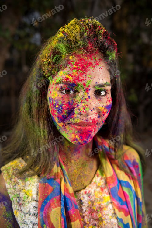 Preview: Portrait Of Happy Young Girl On Holi Color Festival.