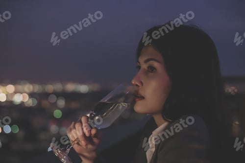 Preview: Concept Of Business Celebrations. Asian Businesswoman Is Drinking Alcohol In The Party. Young