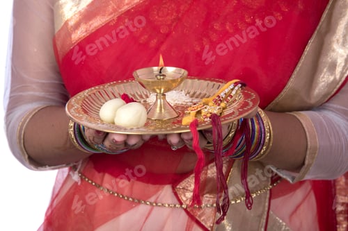 Preview: Indian Girl Performing Worship, Portrait Of A Beautiful Young Girl With Pooja Thali Isolated On