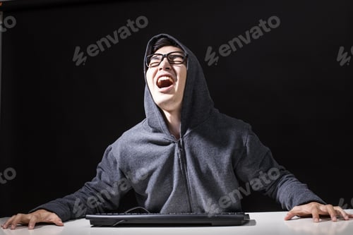 Preview: Man Hacker Have Angry Emotion For Online Hacking, Man With Hacker Concept.