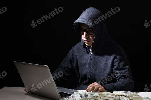 Preview: Hacker Man Hacking Money From Online Business, Man With Hacker Concept.