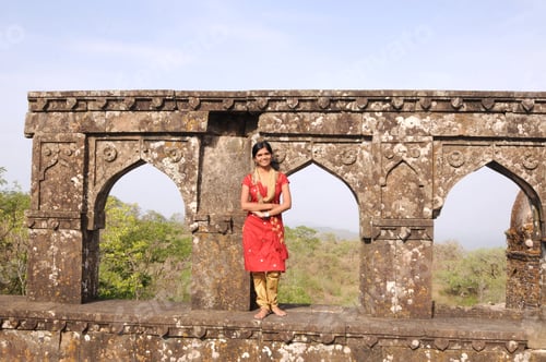 Preview: Portrait Of Smiling Teenage Girl In Front Of Fort