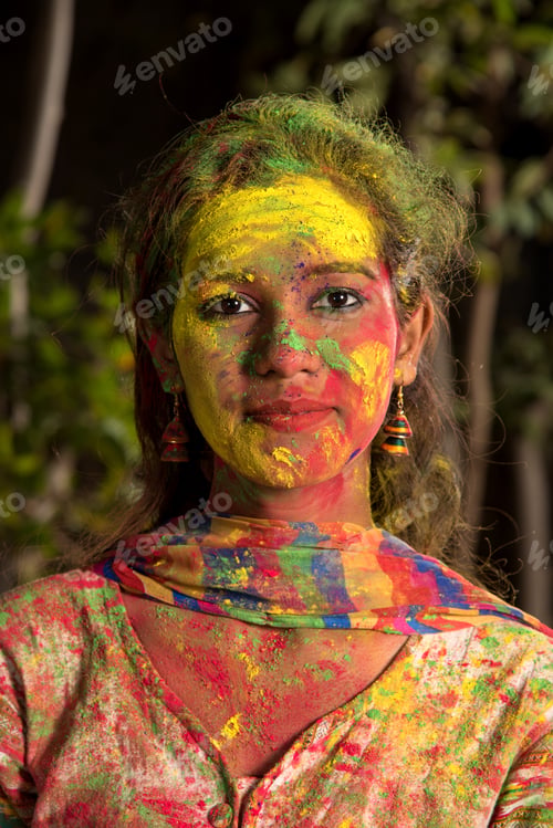 Preview: Portrait Of Happy Young Girl On Holi Color Festival. Girl Posing And Celebrating Festival Of Colors.