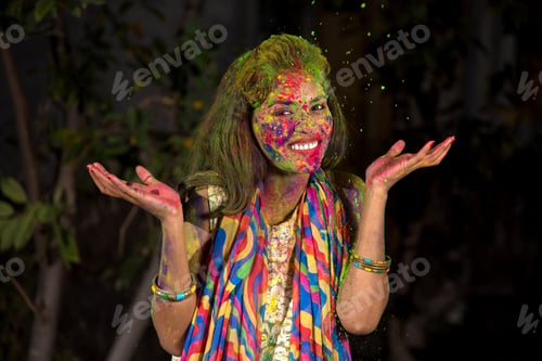 Preview: Young Girl Plays With Colors. Concept For Indian Festival Holi. Color Splash.