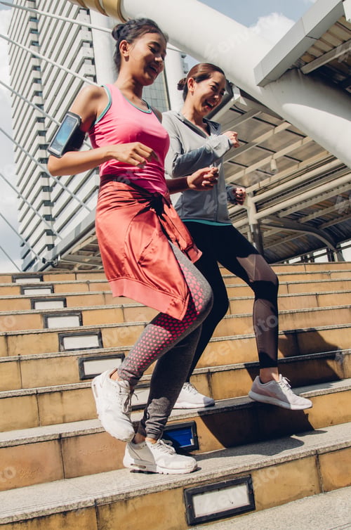 Preview: Two Beautiful Asian Woman Running In City. Sport Concept