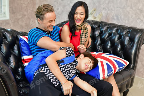 Preview: Family Concept. Family Is Happy In The House. The Family Is Playing In The Living Room. The Family
