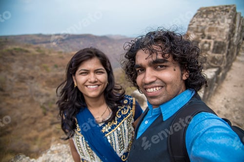 Preview: Indian Couple Taking A Selfie. Man Taking A Selfie With His Wife Or Girlfriend In Front Of Gawilgad