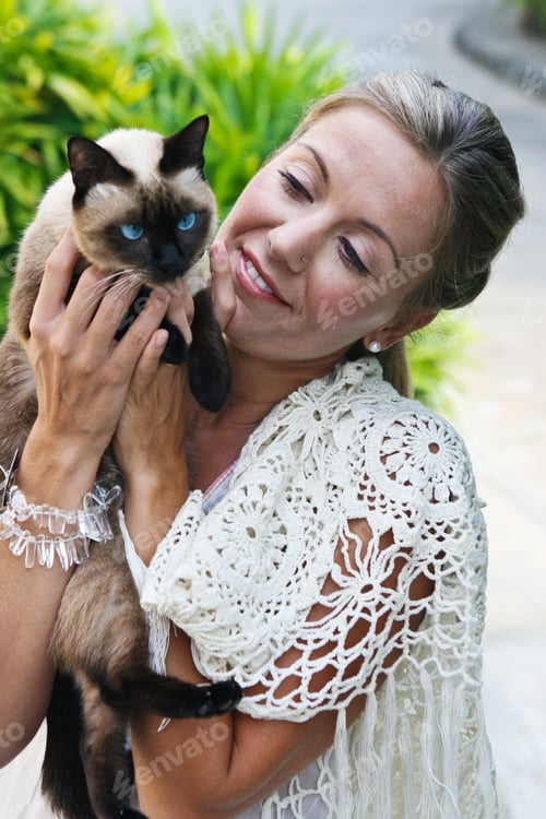 Preview: Woman Holding Her Pet Cat.