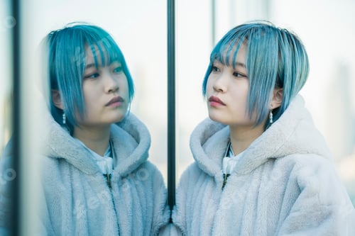 Preview: Young Woman And Her Reflection
