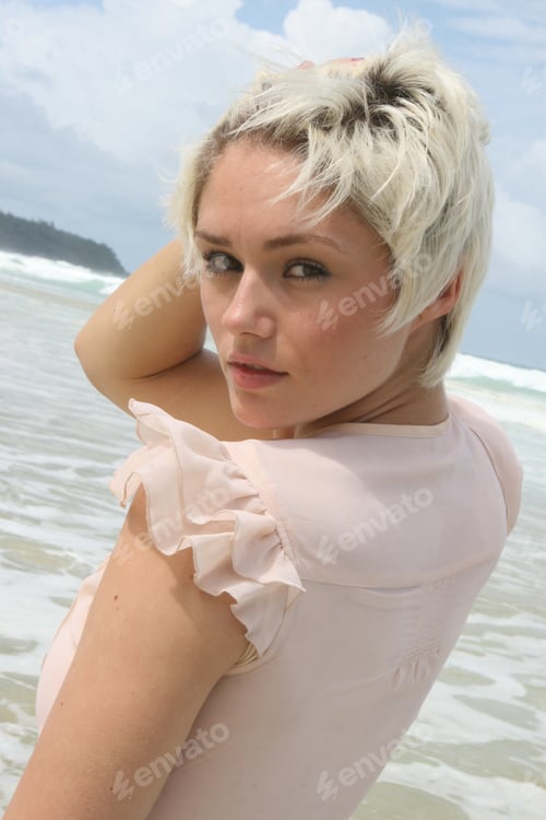 Preview: Portrait Of A Beautiful Blond Woman At The Beach.