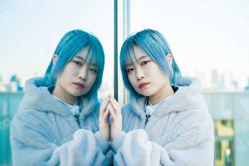 Preview: Young Woman And Her Reflection