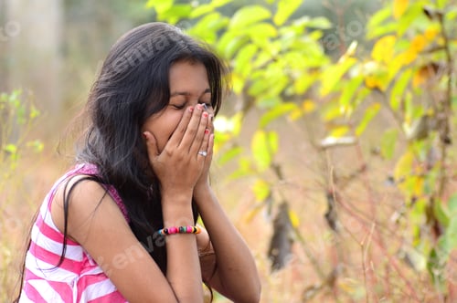 Preview: Close-Up Portrait Of Beautiful Teenage Girl With Expression.