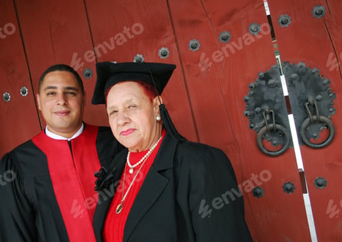 Preview: Degree Graduate In Robes With His Grandmother. International Student Graduates From A South Korean