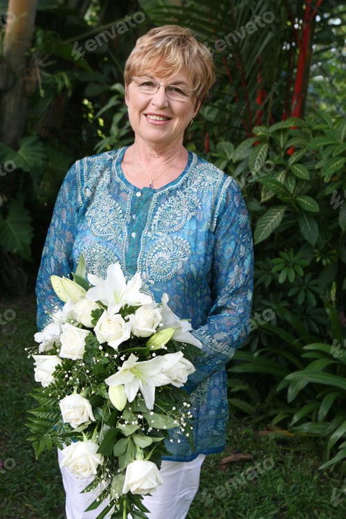 Preview: Mature Bride With A Bouquet Of Flowers.