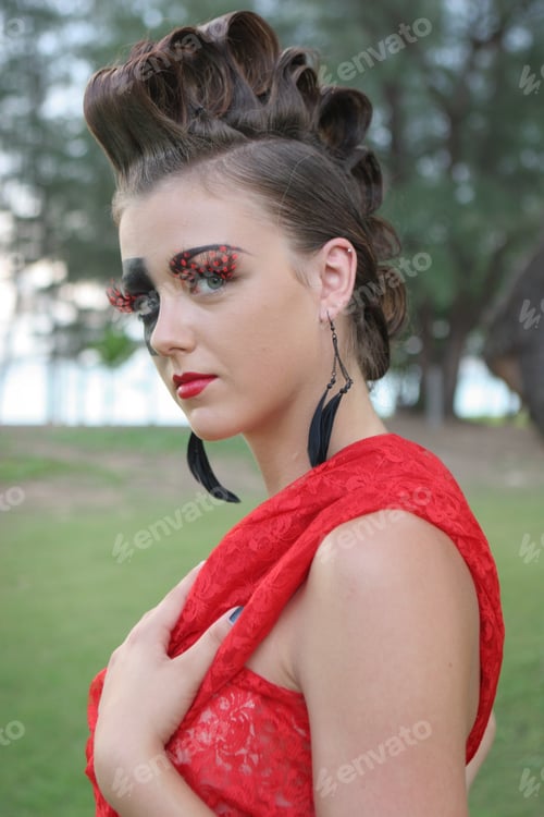 Preview: Fashion Image With Bold Make-Up And Modern Hairstyle.