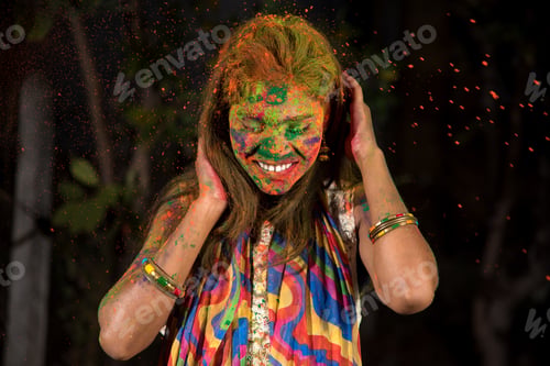 Preview: Young Girl Plays With Colors. Concept For Indian Festival Holi. Color Splash.