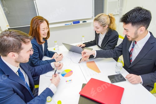 Preview: Business People Discussing In A Meeting Room