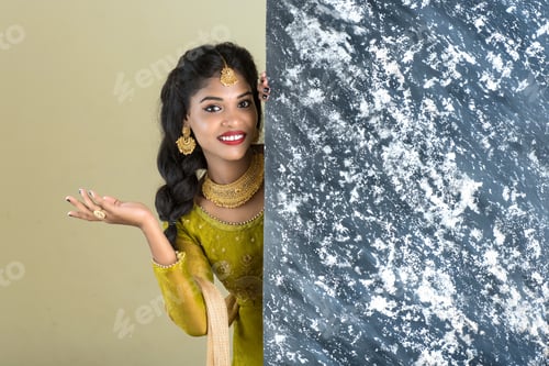 Preview: Traditional Girl Holding And Showing Textured Board