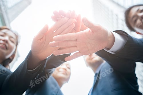 Preview: Business Team Piling Up Hands
