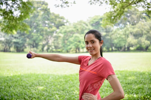 Preview: Exercise Concept. Beautiful Girl Is Stretching Her Muscles. Beautiful Girl Doing Exercises With