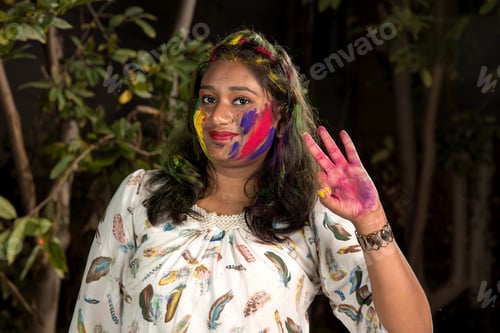 Preview: Portrait Of Happy Young Girl On Holi Color Festival. Girl Posing And Celebrating Festival Of Colors.