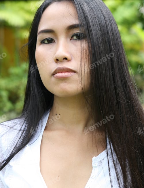 Preview: Portrait Of A Beautiful Asian Woman With Long Hair.