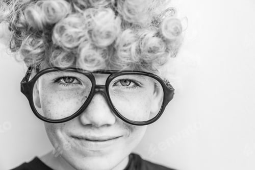 Preview: Black And White Photo Of A Geeky Kid.
