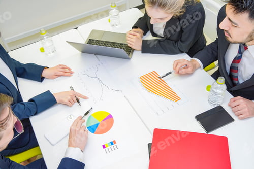 Preview: Business People Discussing In A Meeting Room