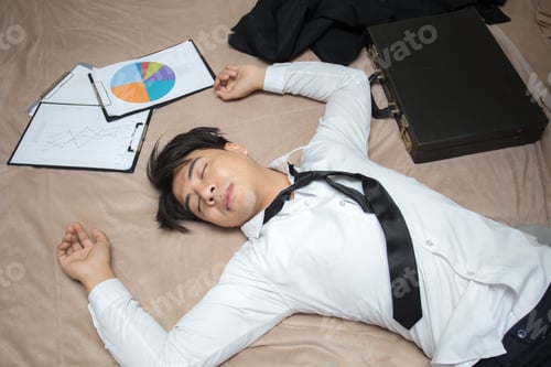 Preview: Asian Businessman Is Deep Sleeping In His Bed At Night. Businessman Tired Concept.