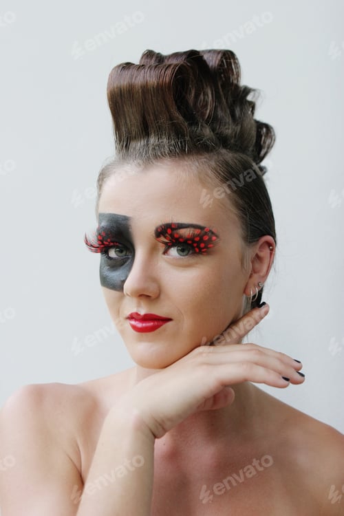 Preview: Fashion Image With Bold Make-Up And Modern Hairstyle.