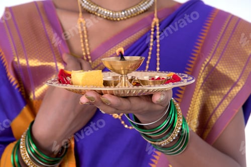 Preview: Indian Woman Performing Worship, Portrait Of A Beautiful Young Lady With Pooja Thali Isolated On