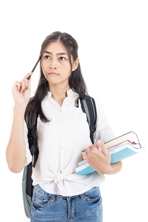 Preview: Portrait Of Beautiful Young Asian Woman Student Holding Book With Serious Emotion Isolated On