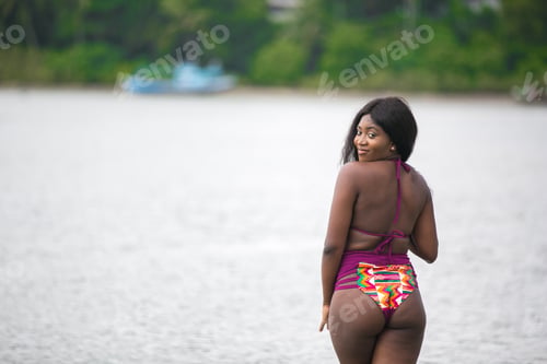 Preview: Beautiful African Woman At The Beach On Summer Holidays.
