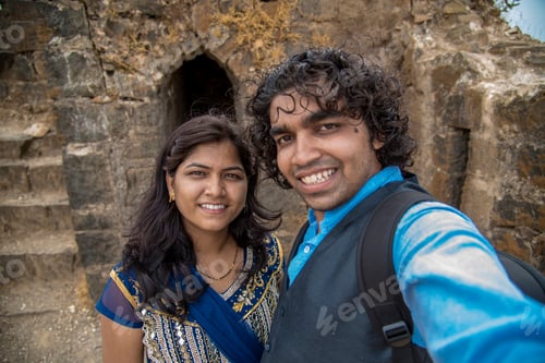 Preview: Indian Couple Taking A Selfie. Man Taking A Selfie With His Wife Or Girlfriend In Front Of Gawilgad
