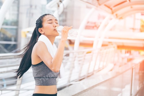 Preview: Asian Woman Drinking Water And Rest When Finish For Exercise, Outdoor Exercise Concept.