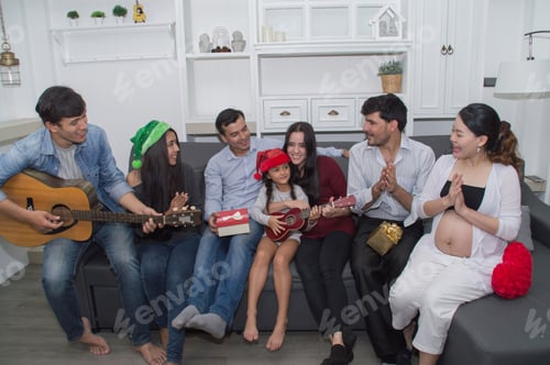Preview: Party Concept. Family Members Are Celebrating New Year In The Home. The Family Is Happy With The