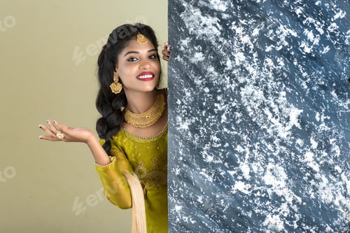 Preview: Traditional Girl Holding And Showing Textured Board