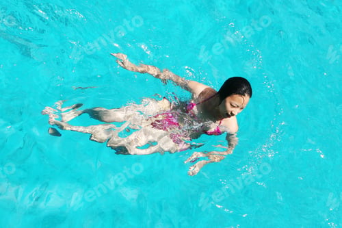 Preview: Woman Swimming In The Ocean.