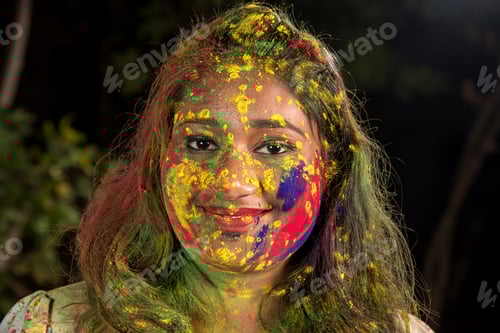 Preview: Portrait Of Happy Young Girl On Holi Color Festival. Girl Posing And Celebrating Festival Of Colors.